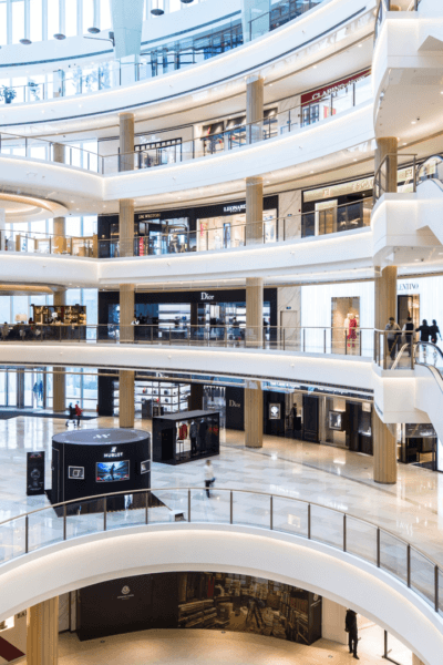 A luxury retail atrium seen across several floors